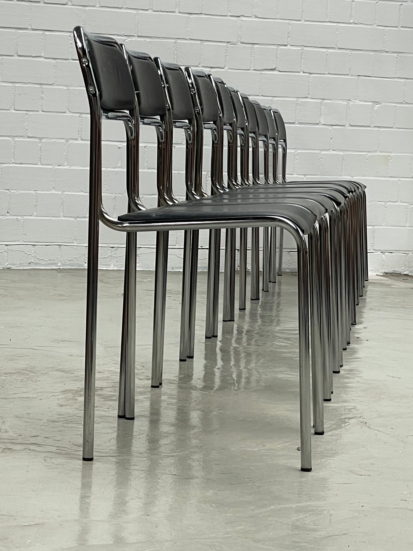 Bauhaus | Chrome | Stackable | Chair | modern | Vintage | upholstered in a black faux leather
