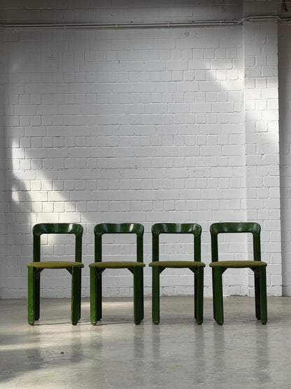 Green Bruno Rey chairs with green fabric