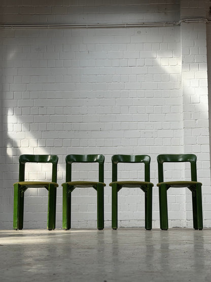 Green Bruno Rey chairs with green fabric