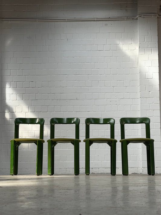 Green Bruno Rey chairs with green fabric