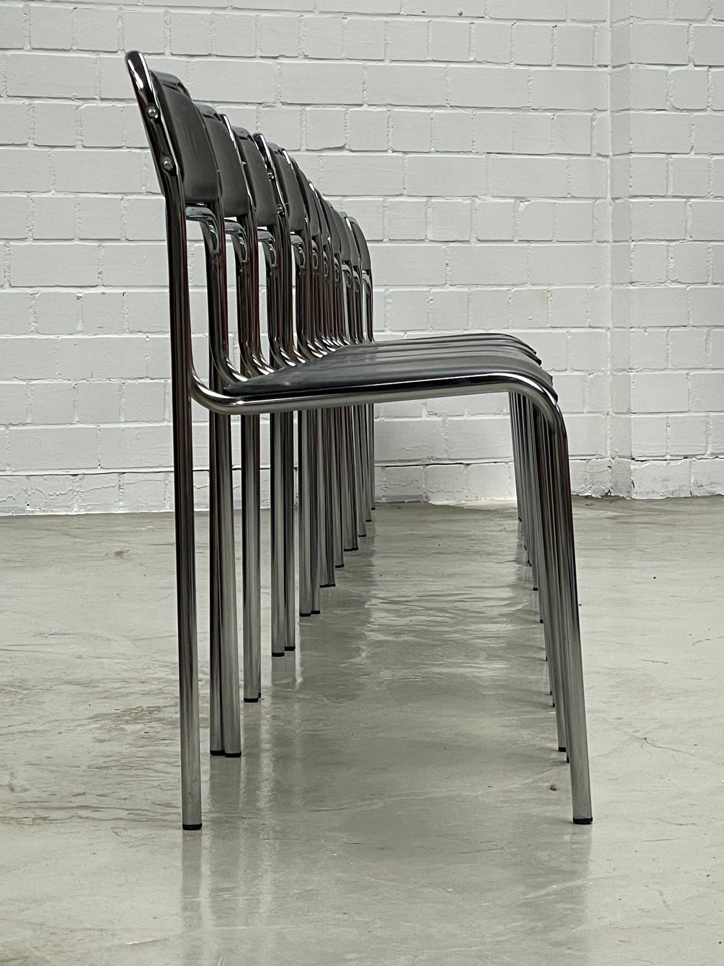 Bauhaus | Chrome | Stackable | Chair | modern | Vintage | upholstered in a black faux leather