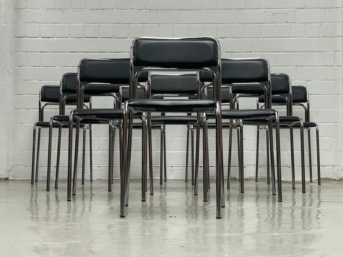 Bauhaus | Chrome | Stackable | Chair | modern | Vintage | upholstered in a black faux leather