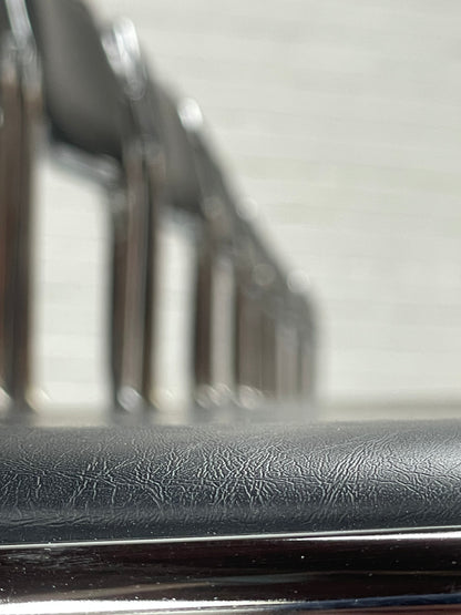 Bauhaus | Chrome | Stackable | Chair | modern | Vintage | upholstered in a black faux leather