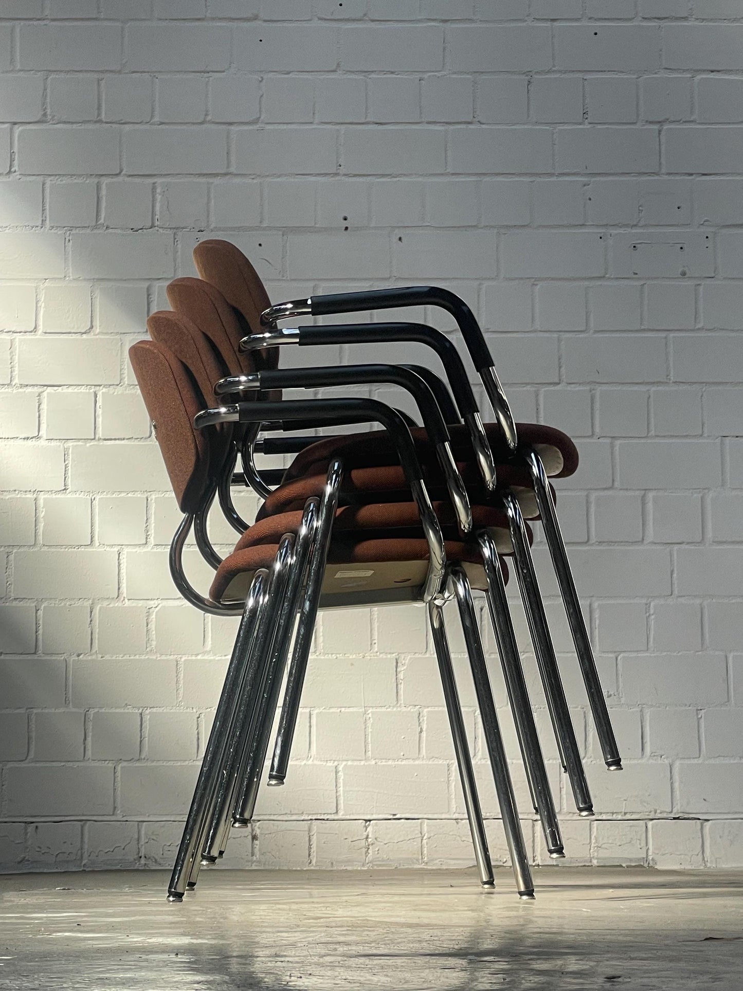 Vintage Bauhaus Chrome Tubular Chair: Stacking Armchair, Brown Fabric