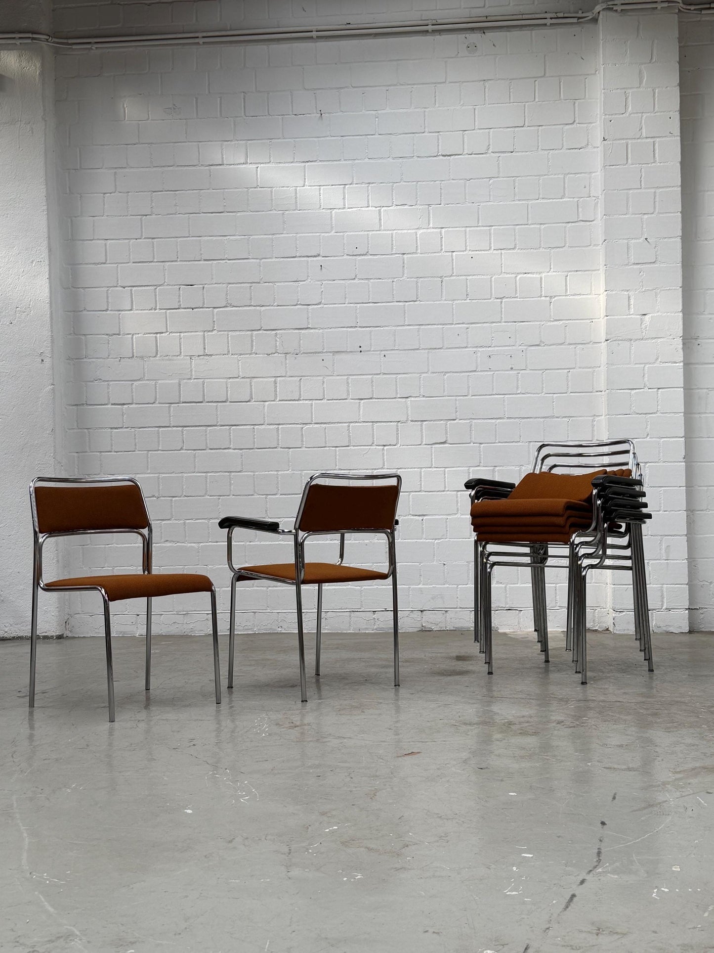 Bauhaus | Chrome | Stackable | Chair | modern | Vintage | West-Germany | upholstered in  brown fabric
