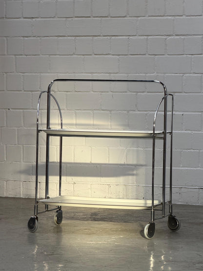 Vintage | Folding Bar-Cart | Chrome | Mid-Century | Serving Trolley | 2-Tier Rolling Storage | Cream Shelves | Bauhaus | West Germany